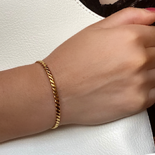 将图片加载到图库查看器,A Gold Plated Weave Cuff Bracelet on a women's wrist clutching a white bag