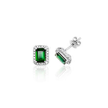 Load image into Gallery viewer, Rectangular emerald green square rhodium plated on sterling silver studs, surrounded by a halo of diamond looking zirconia&#39;s , all on white background
