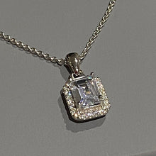 将图片加载到图库查看器,stunning silver and white gold square claw set imitation diamond on plain silver bale. The centre stone is surrounded by a halo of little diamonds, image on grey background
