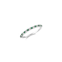 Load image into Gallery viewer, thin emerald green and diamond ring each stone claw set on white gold on sterling silver. The ring is a half eternity ring on white background
