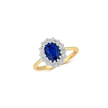 Cargar imagen en el visor de la galería, Blue Sapphire Diana Inspired Oval Cluster Ring Surrounded by Round Diamonds all claw set on a 9ct yellow gold band, white background
